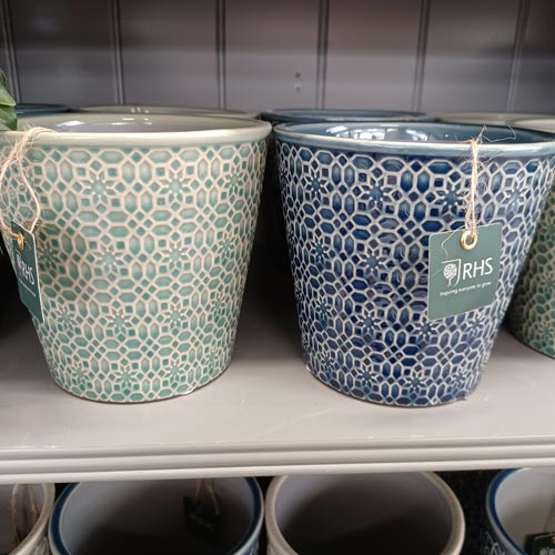 A range of RHS ceramic pot holders was eye-catching on shelf.